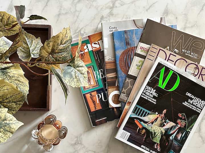 #magazines #catalogs #plants #candleholder #marble #tabletray #tray #inspiration **Magazines/Catalogs** Those inspire my home styling. On another note…I love my marble top coffee table. The tabletop provides a gorgeous and luxe background for photographing objects that I place on it. 