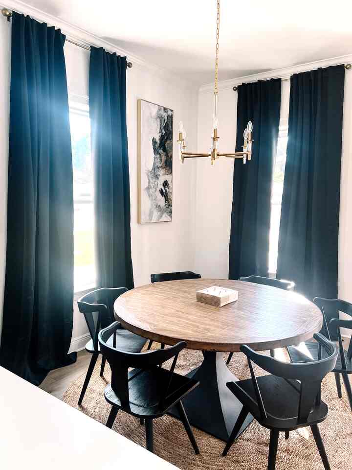 Modern Farmhouse Dining room #blackoutcurtain #blackcurtains #goldlightfixture #diningchair 