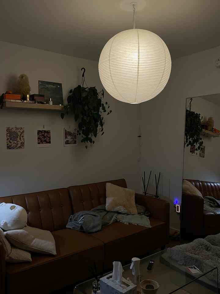 This is a sign to get that paper lantern as a statement piece for your living room #livingroominterior #paperlantern #lightinginterior 