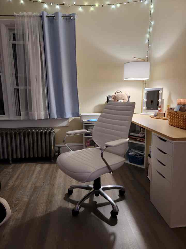 Right across the opposite corner of my couch is my home #office space/ self care #beauty corner. I love my white #chair that is comfortable enough for an office chair and #fabulous enough to be a beauty chair! 
Behind the chair you’ll see a completely #customized desk made up of different #ikea drawers and cubbies, as well as a thick and heavy #wooden top that i ordered from Amazon. I  love adding #natural #elements to my home and i thought a wooden desk top would bring a great #balance to an all white ikea desk! 