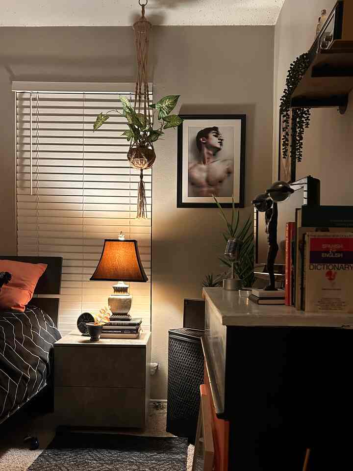 **Mixing vintage with Contemporary** My bed and my nightstand are examples of contemporary furniture, while the lamp and the alarm clock are examples of vintage styles. These items and the rest still make for a cohesive look and style in this room. ￼Here is a nighttime shot of my bedroom. #vintageatmosphere #contemporary #eclectic #mixingstyles #bedroomstyling 