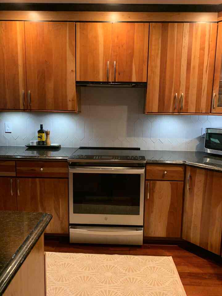 When we purchased this house, we loved the #flatpanel kitchen cabinets, but did not like the ￼beige Corion countertops and lack of a #backsplash. To let the cabinets shine we chose a matte finish elongated #hexagontile   to add interest but not compete with the cabinets. New appliances completed the update. This range is the highlight of my kitchen. It air fries and it has a ￼convection oven. The oven steam cleans and the cooktop wipes down so easily. I highly recommend the #GEprofile appliances.  