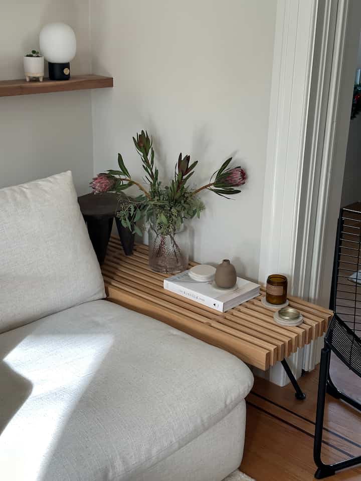 new favorite nook in the living room 🤍🤎
#livingroominterior #interiors #ikea #heathceramics #apartmentinterior 