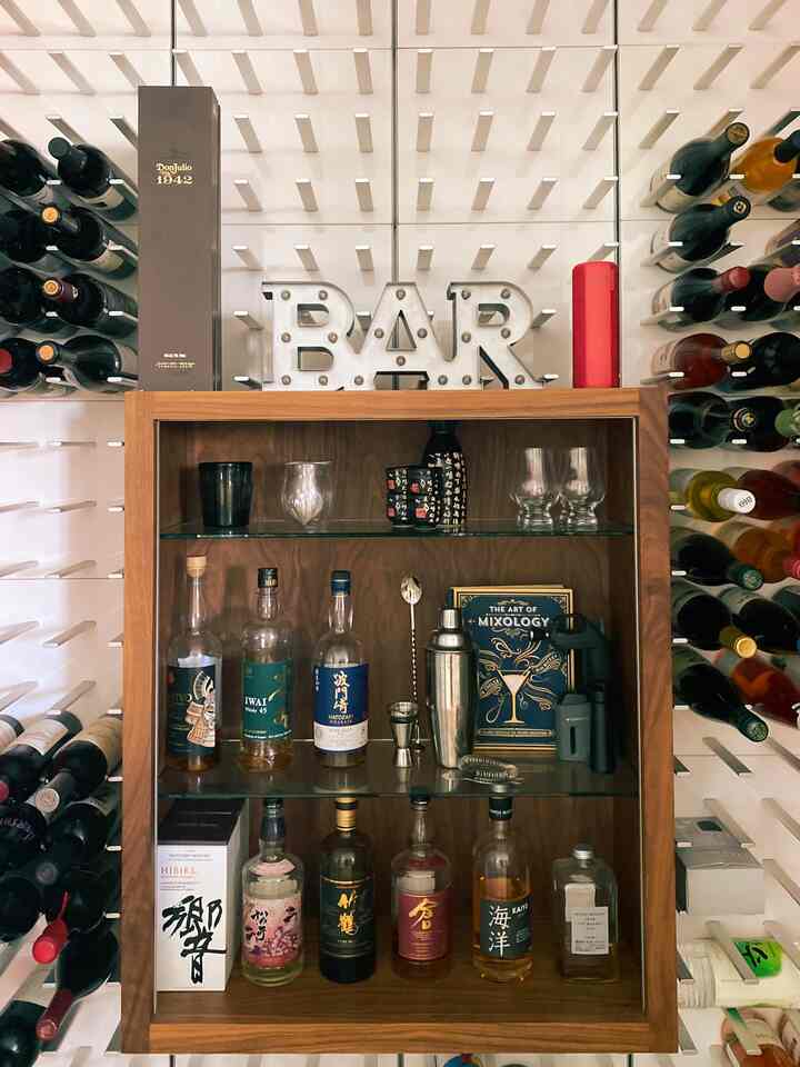 My Wine Wall and Bar Cabinet 🍸🍷

The wine wall elegantly displays a curated selection of white and red wines. At the heart of it all is a chic bar cabinet, featuring an array of whiskeys.

#winewall #bar #homebar 