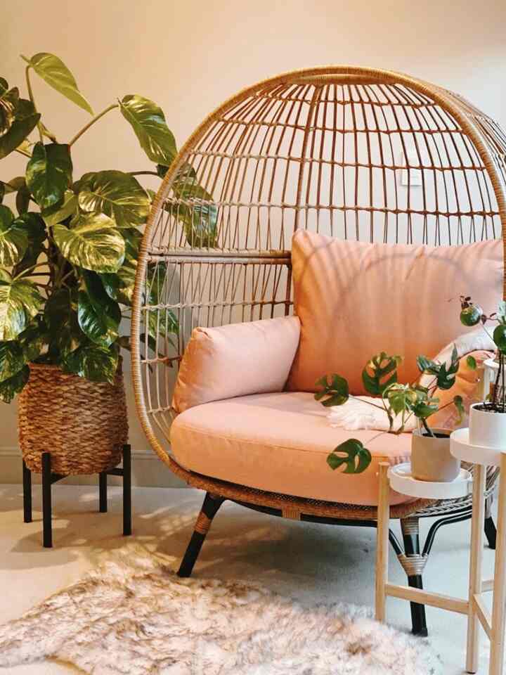 Step into my enchanting reading nook corner; complete with a cozy patio egg chair and lush indoor plants. This is my happy place. #eggchair #plantstand #readingnook