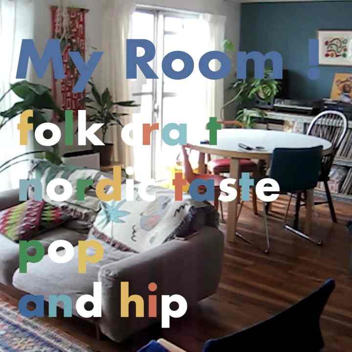 White ceiling and wood-toned floor Nordic-style dining room with sofa, plants, and wall lighting in a natural modern living space