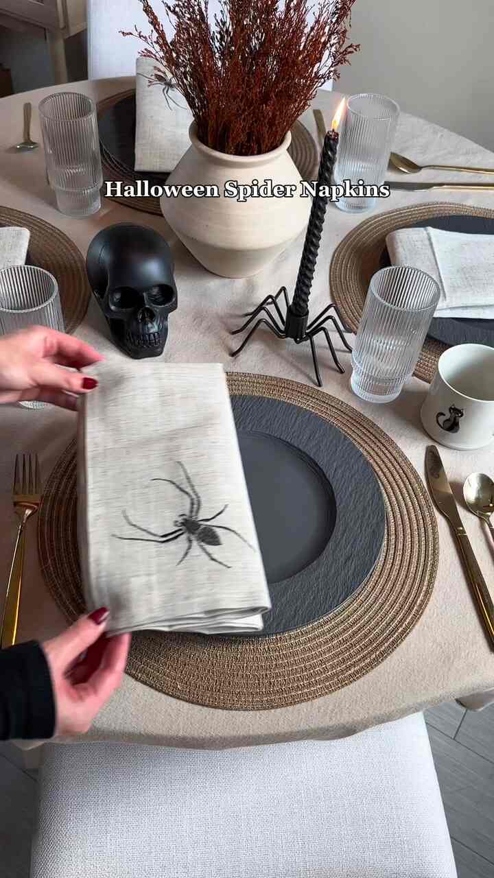 How fun are these emroidered linen halloween spider napkins that I used to set my dining table with! #tablescape #tablesetting #diningtable 