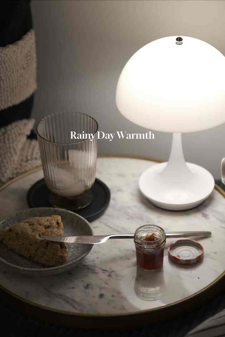 The warm scone, fall greens, and gentle lamp glow make this space my reminder to slow down and be thankful.
Rain tapping outside and this little setup inside always bring me back to what matters.
#homegratitude #cozyvibes #thankfulathome #mindfulmoments