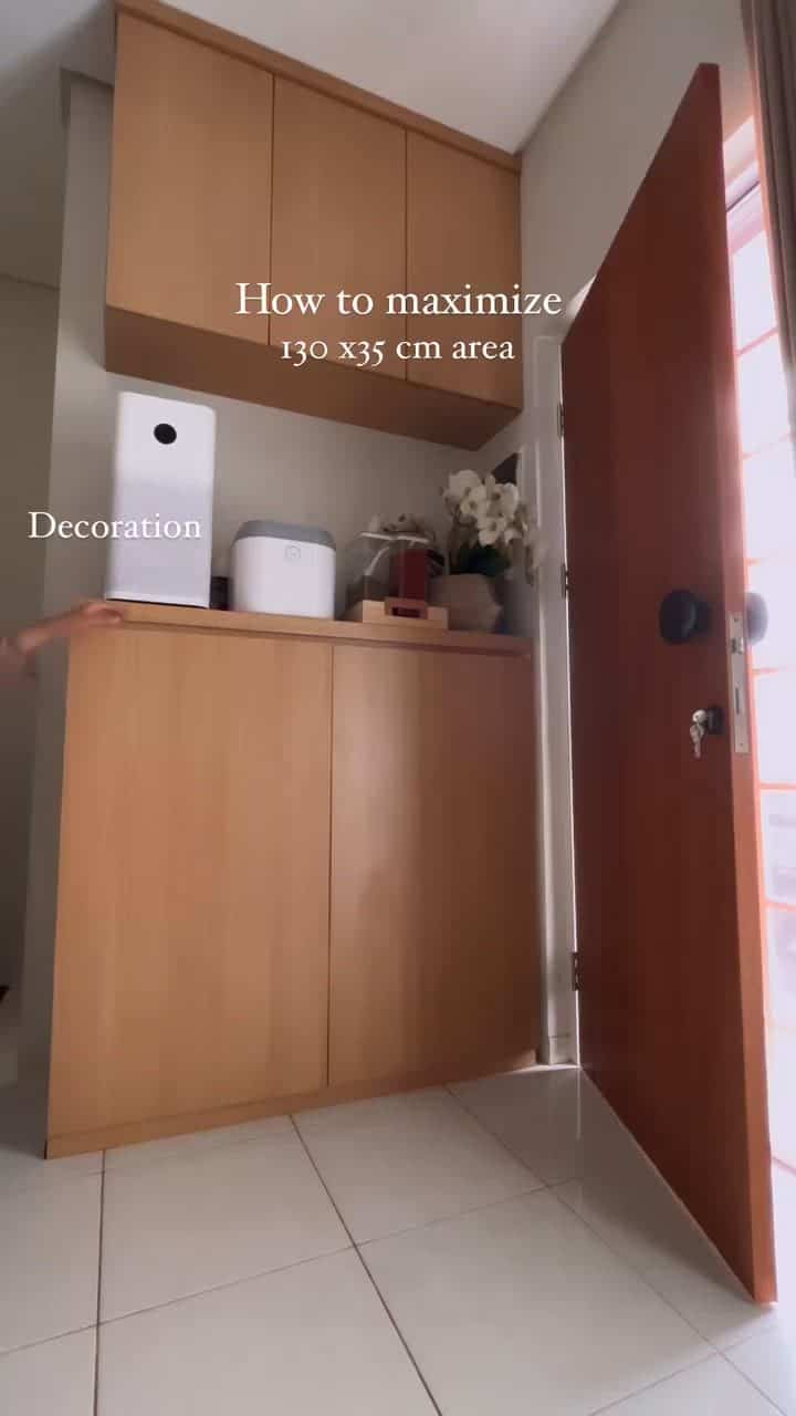 Warm wood tones and white flooring entrance storage space, simple and natural Japandi style interior