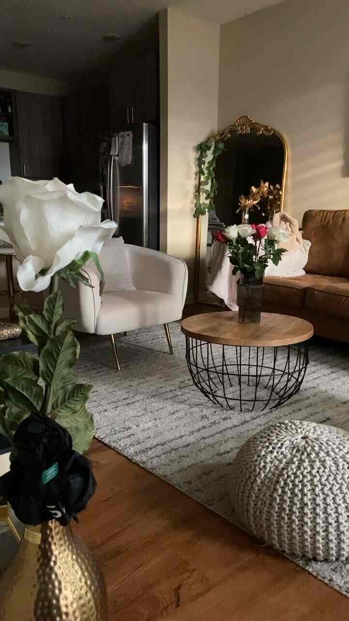 This room is an inviting earthy aesthetic with a luxurious gold flare. #earthyaesthetic