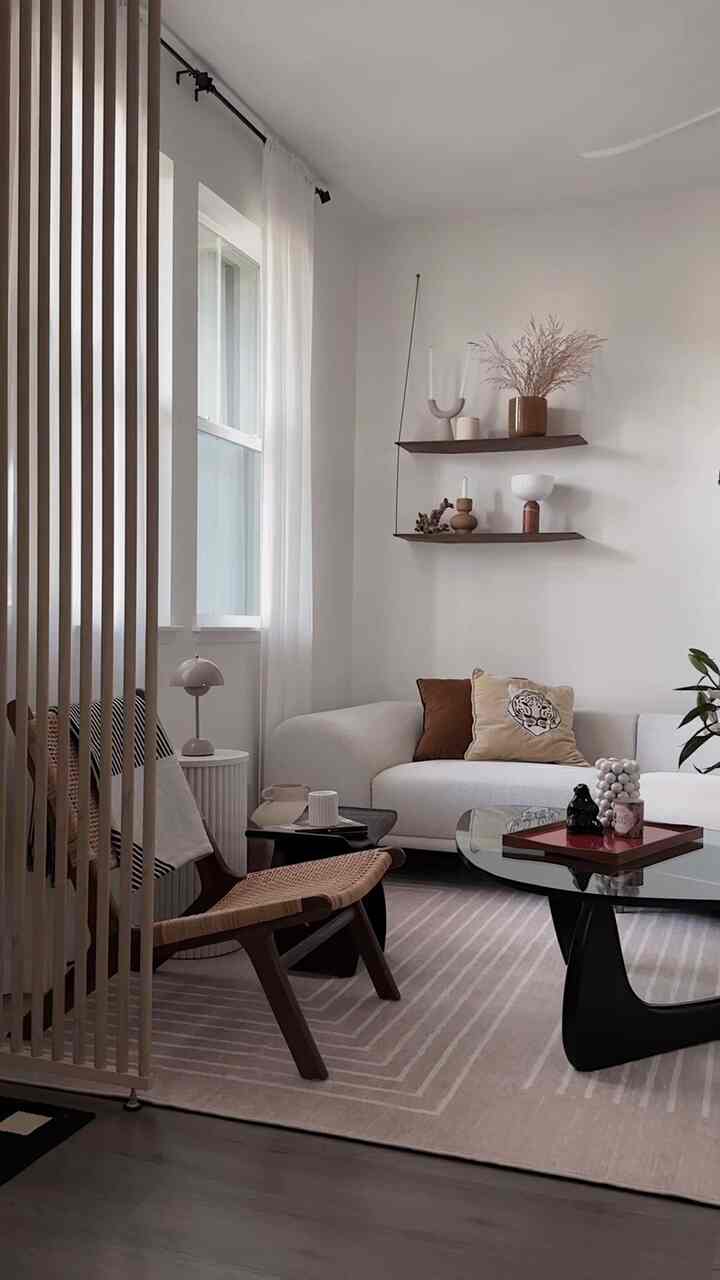 Autumn vibe in my living room.

#livingroom #livingroominterior #livingroomdecoration #loungechair #shelf  #rug #shelfinterior #shelfdecoration #coffeetable #fabricsofa #cushion #lamp #lighting #vase 