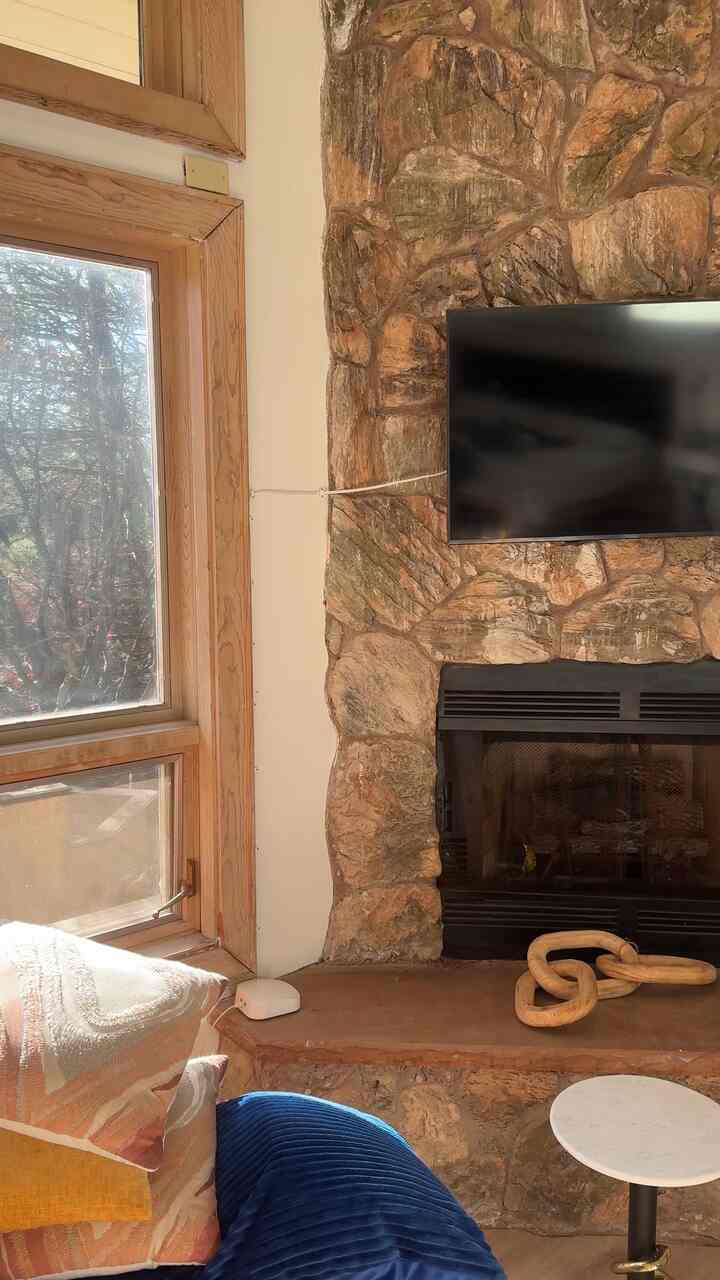 Cozy fireplace in the master #cabin #countrylife #bedroominterior 