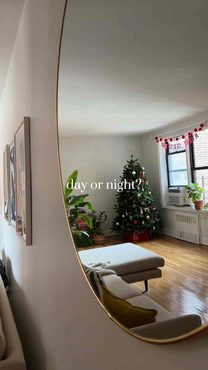 What do you think? 🎄 #moderneclectic #livingroominterior #christmastree #christmas #dayornight