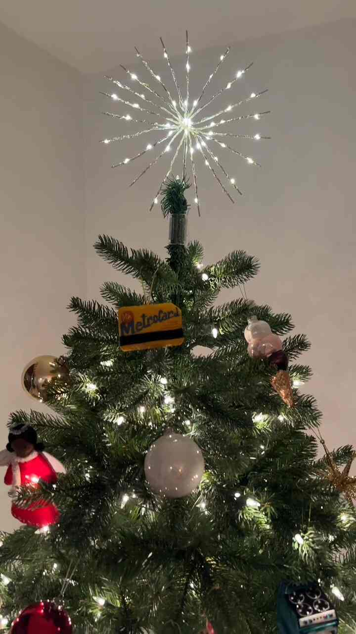 Since I moved on my own, I've been buying one new ornament per year. This year's ornament is a suitcase so that 2025 is full of travels ❤️🎄✈️🧳 #moderneclectic #christmastree #ornament
