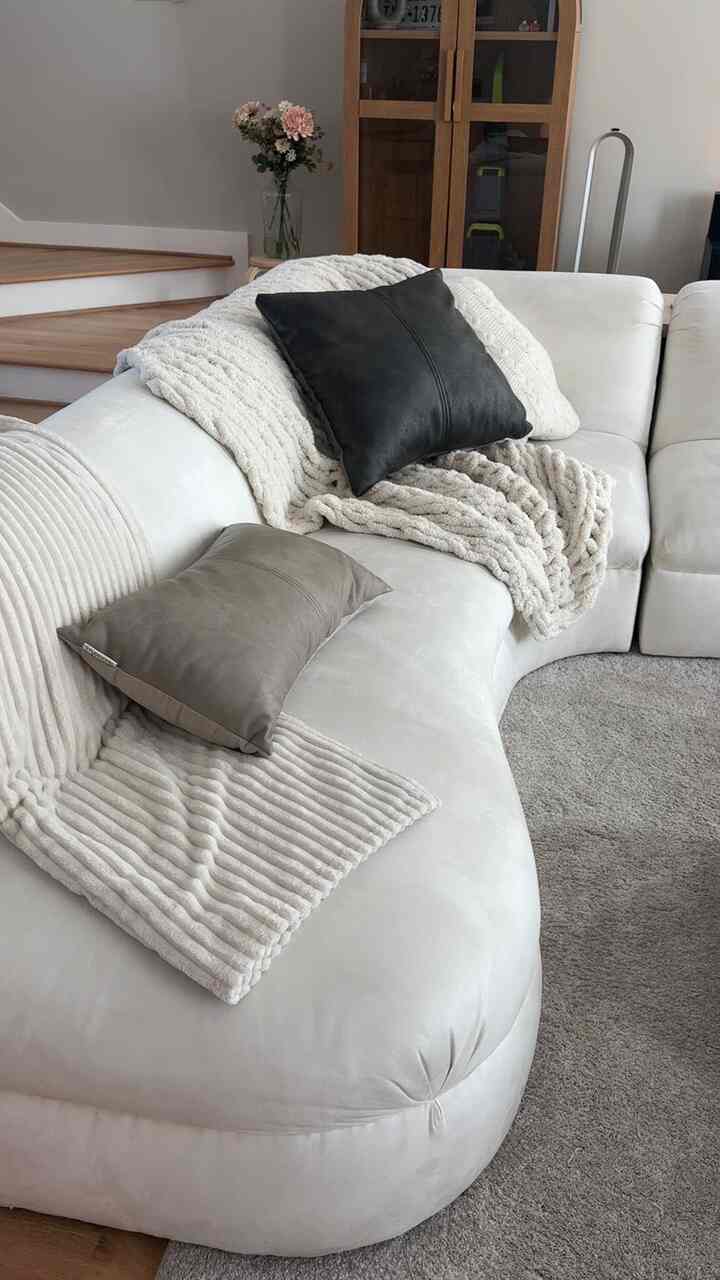 my favorite sofa/couch ever! keeps my living room interesting! 🤍 #japandi #mcm #modern #cozy #wood #leather 