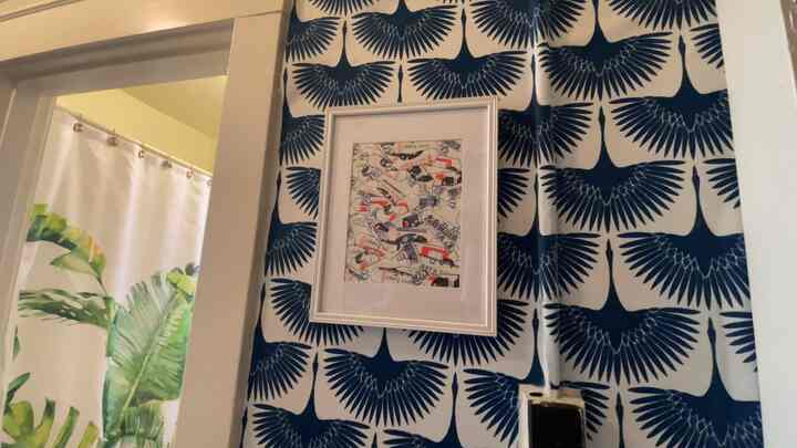This was the entrance hallway of my old apartment. I wallpapered the hallway with this beautiful fabric that made me happy every time I looked at it. #maximalist #entranceinterior #entrancehall #wallpaper 