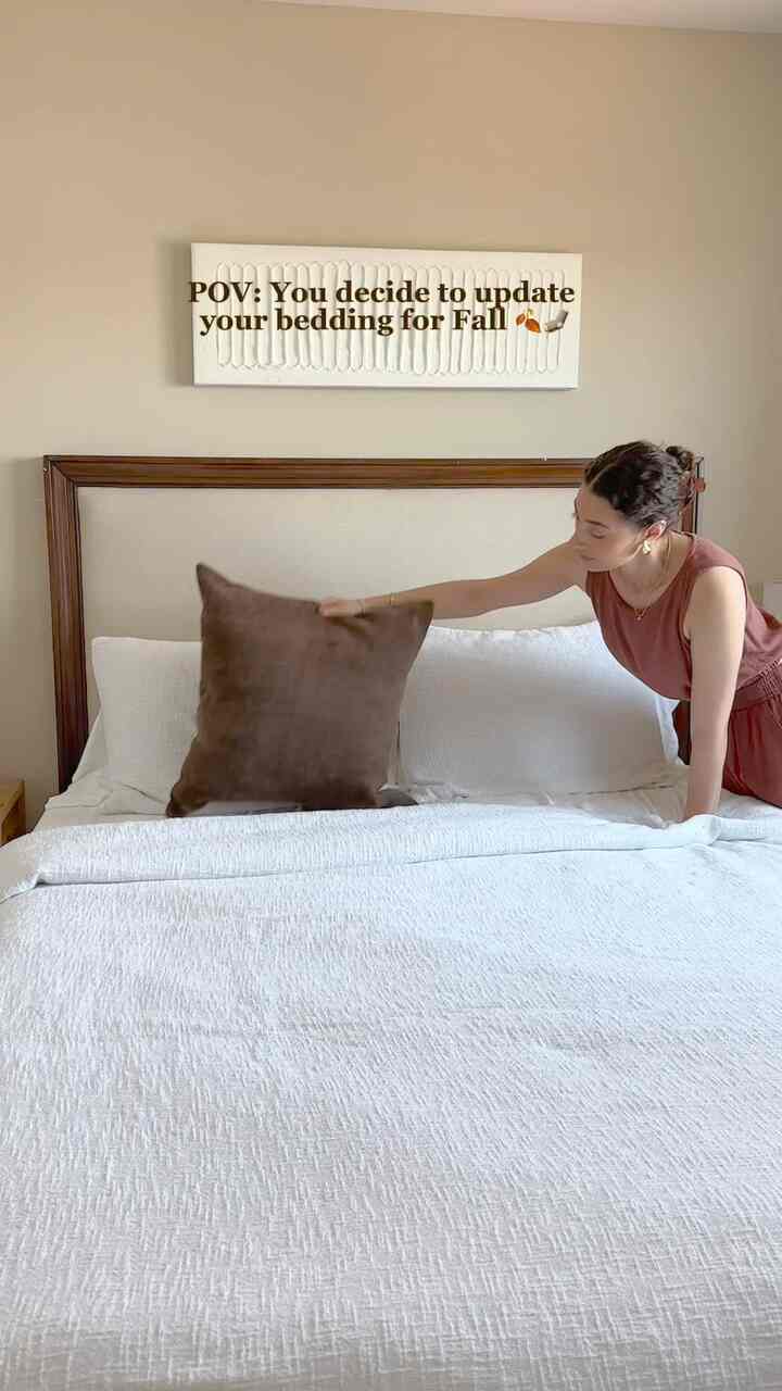 Upgraded my bedding to feel cozier and more charming 🤎  #bedding #bedroom #throwpillows 