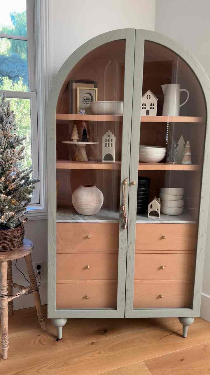 Christmas storage cabinet styling. #christmasdecor #christmasideas #christmastreea