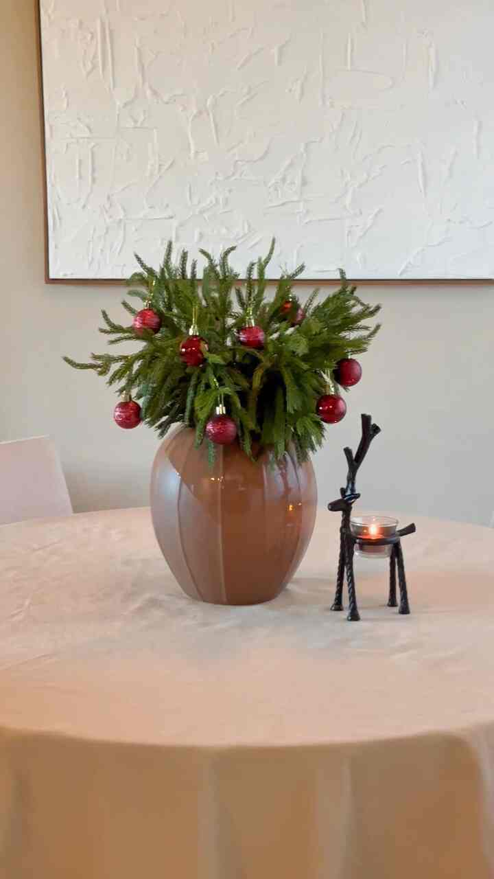 Hung these mini ornaments on these faux stems on my dining table to add a festive touch 🎄 #holidaydecor #ornaments #diningtable 