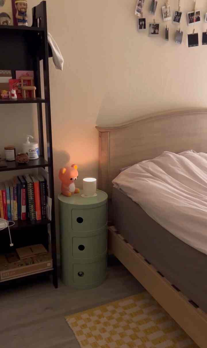Cozying up in my bedroom with my new matcha green nightstand! Perfect spot to put my favorite candle and stuffed animal on top 🫶 #roundnightstandstorage