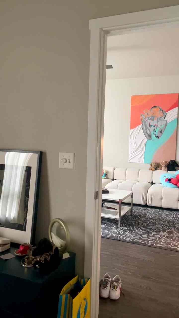 Quick pan of my old living room! Loved curating this art filled space #artist #curation