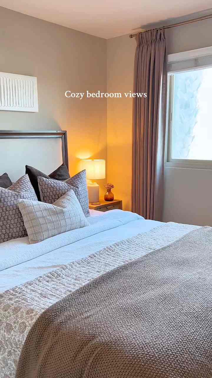 Cozy bedroom views 🤎 Over the past several months I have been enjoying making small design changes to our bedroom, like adding cozy bedding, pleated brown curtains, playing with prints, and switching around some decor. This room is feeling a lot more complete! Thinking to add some printed sheets next 😊 

#bedroom #bedroomdecor #browndecor #moodybedroom #printmixing #springdecor 